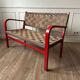 Banc vintage en bois rouge et corde