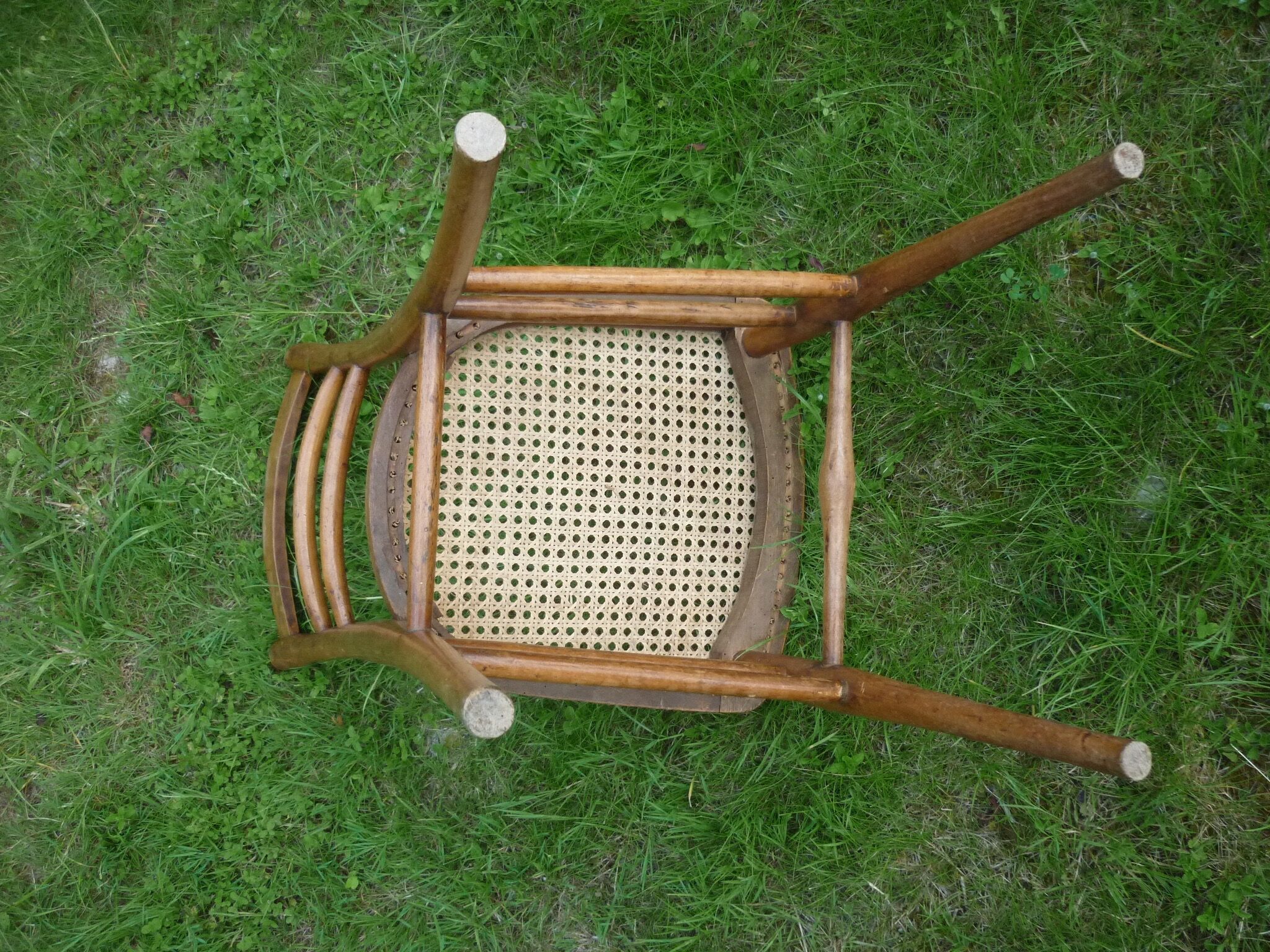 Wooden bistro style cane chair