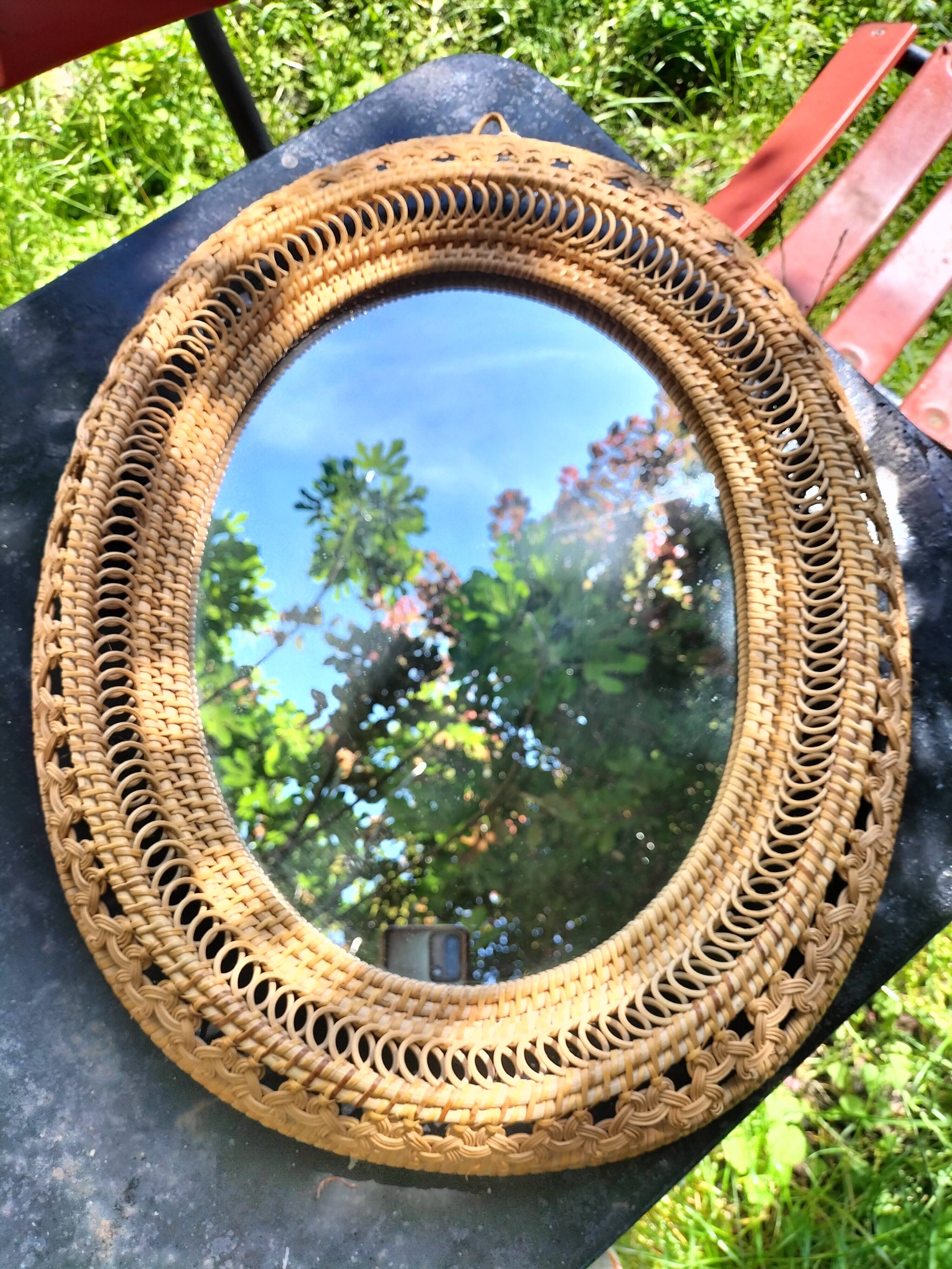 Oval rattan mirror