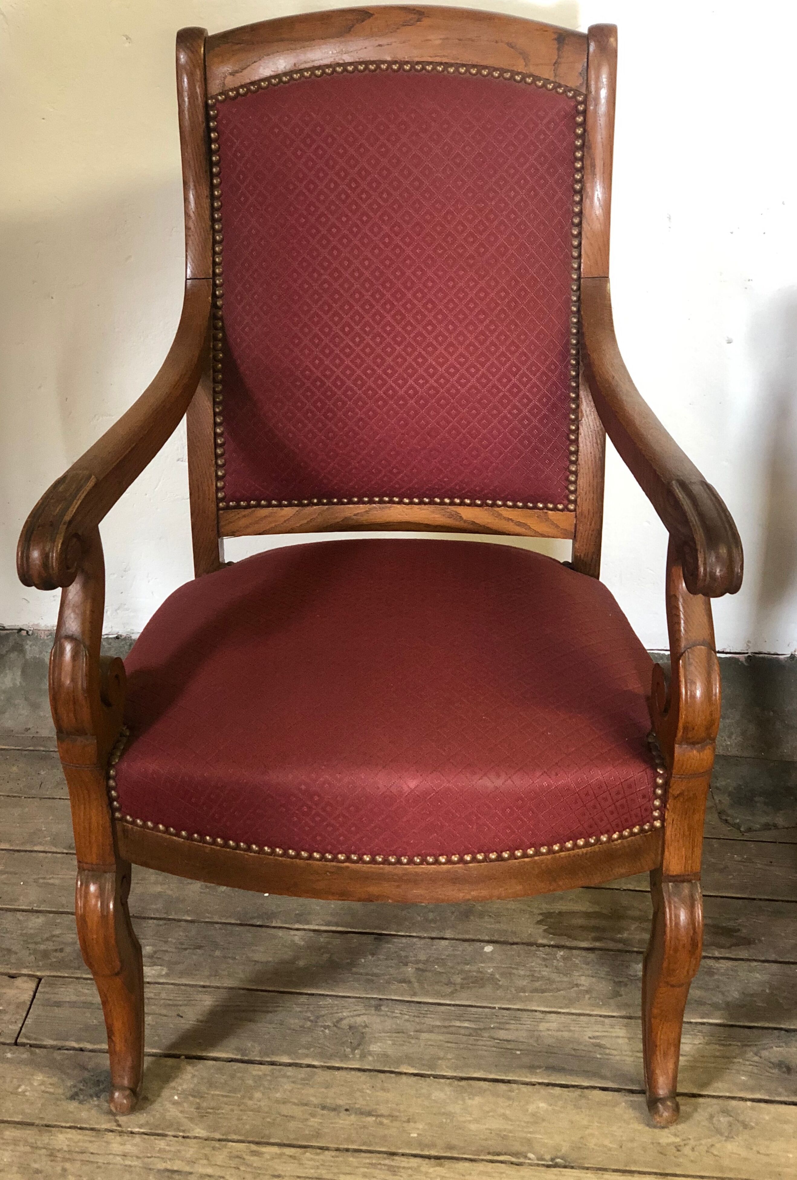 Louis Philippe era armchairs in burgundy-lined ground oak