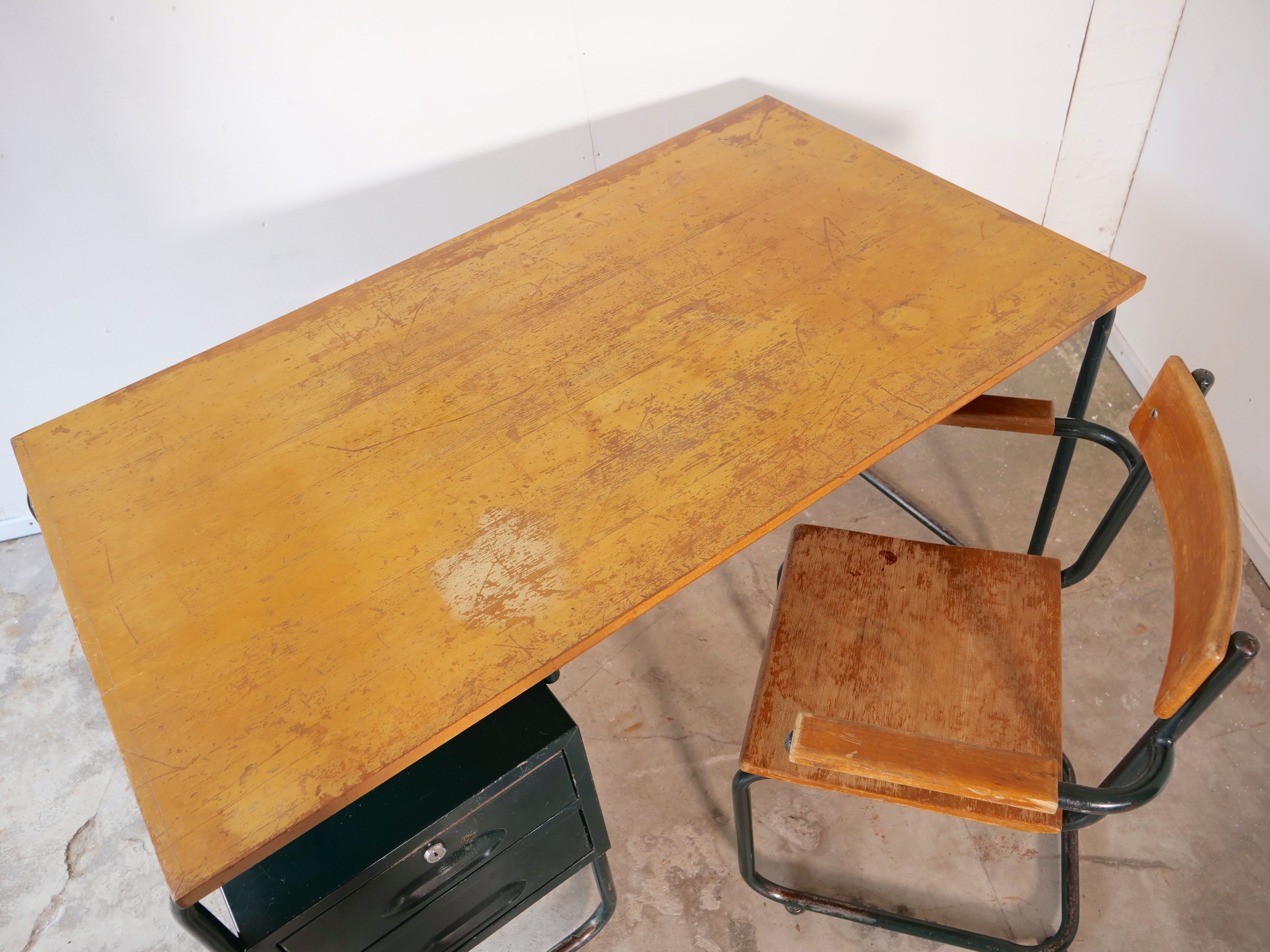Desk with bauhaus style tubular steel chair