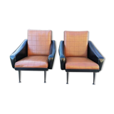 Paire de fauteuils en simili cuir