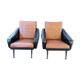 Paire de fauteuils en simili cuir