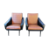 Paire de fauteuils en simili cuir