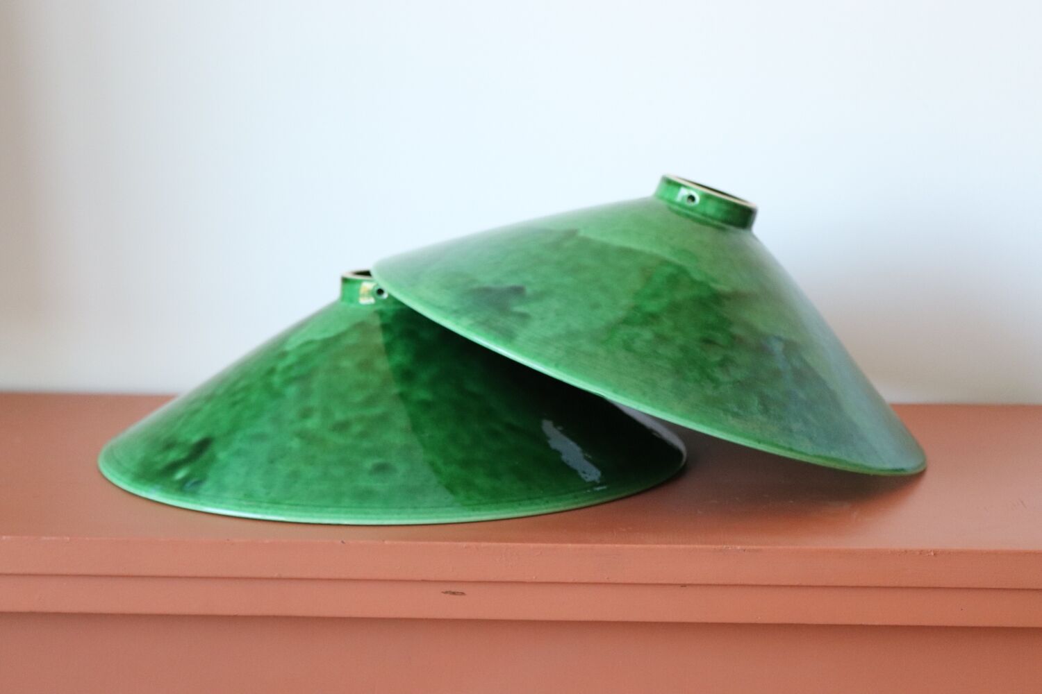 Two vintage green ceramic lampshades