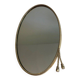 Oval brass mirror surrounded by a cord.