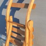 Foldable children's chair with beveled wooden slats