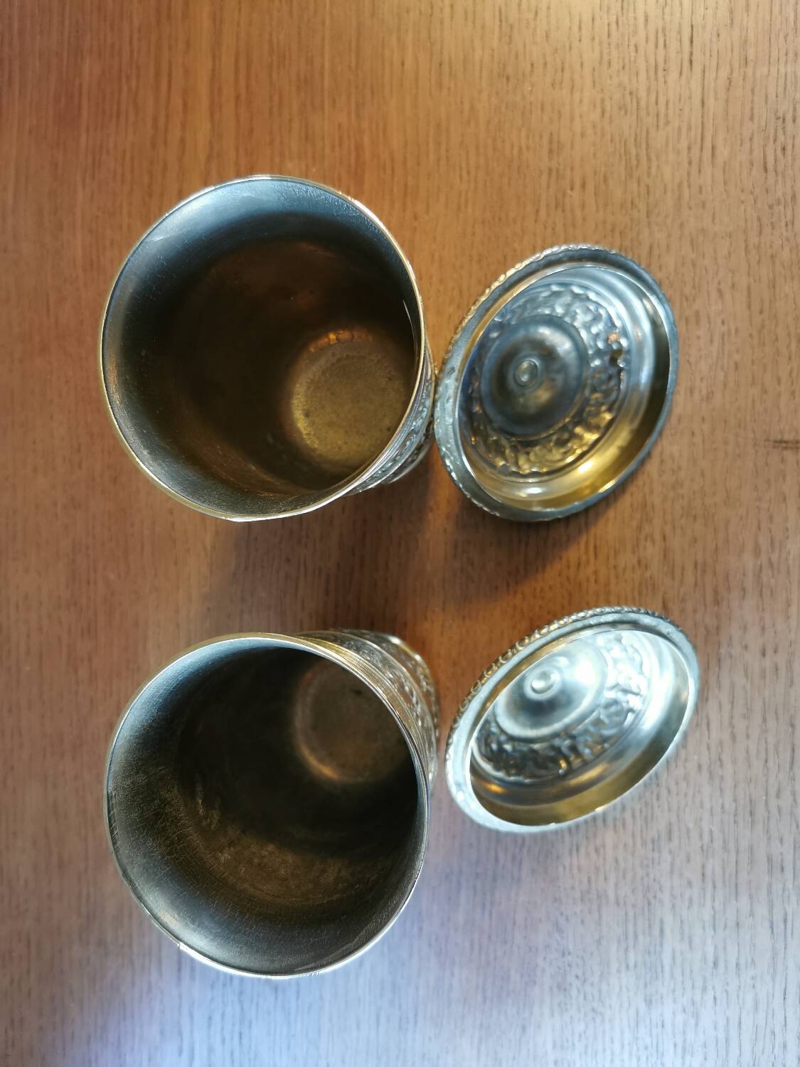 Pair of antique chiseled metal candy boxes