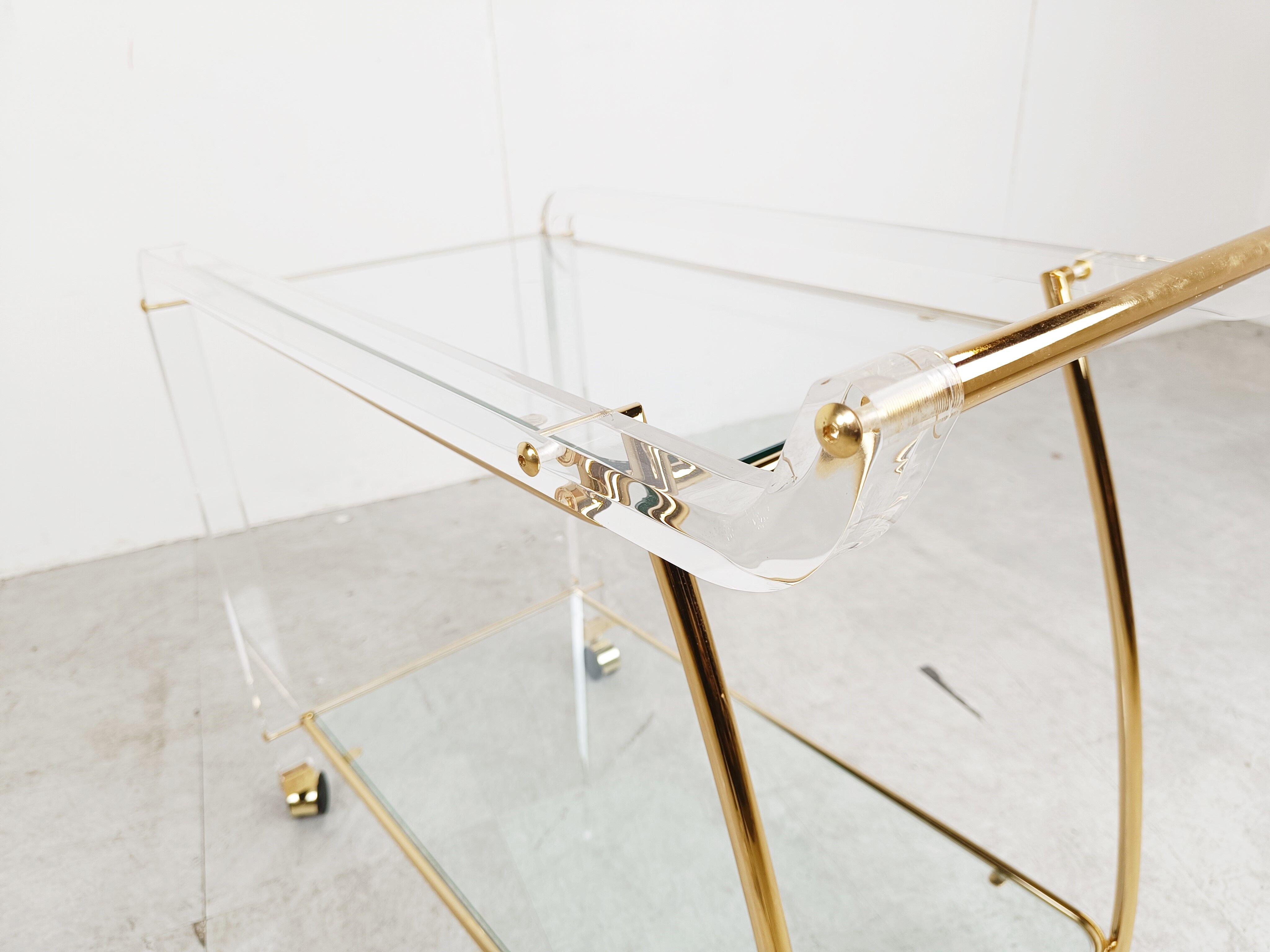 Brass and lucite drinks trolley, 1970s