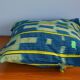 Housse de coussin en tissu baoulé jaune