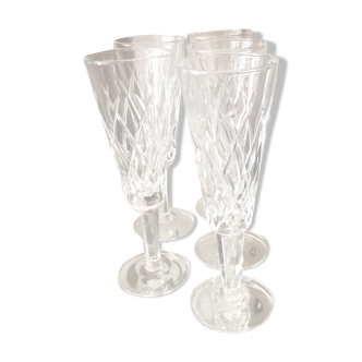 Suite of 5 crystal champagne flutes