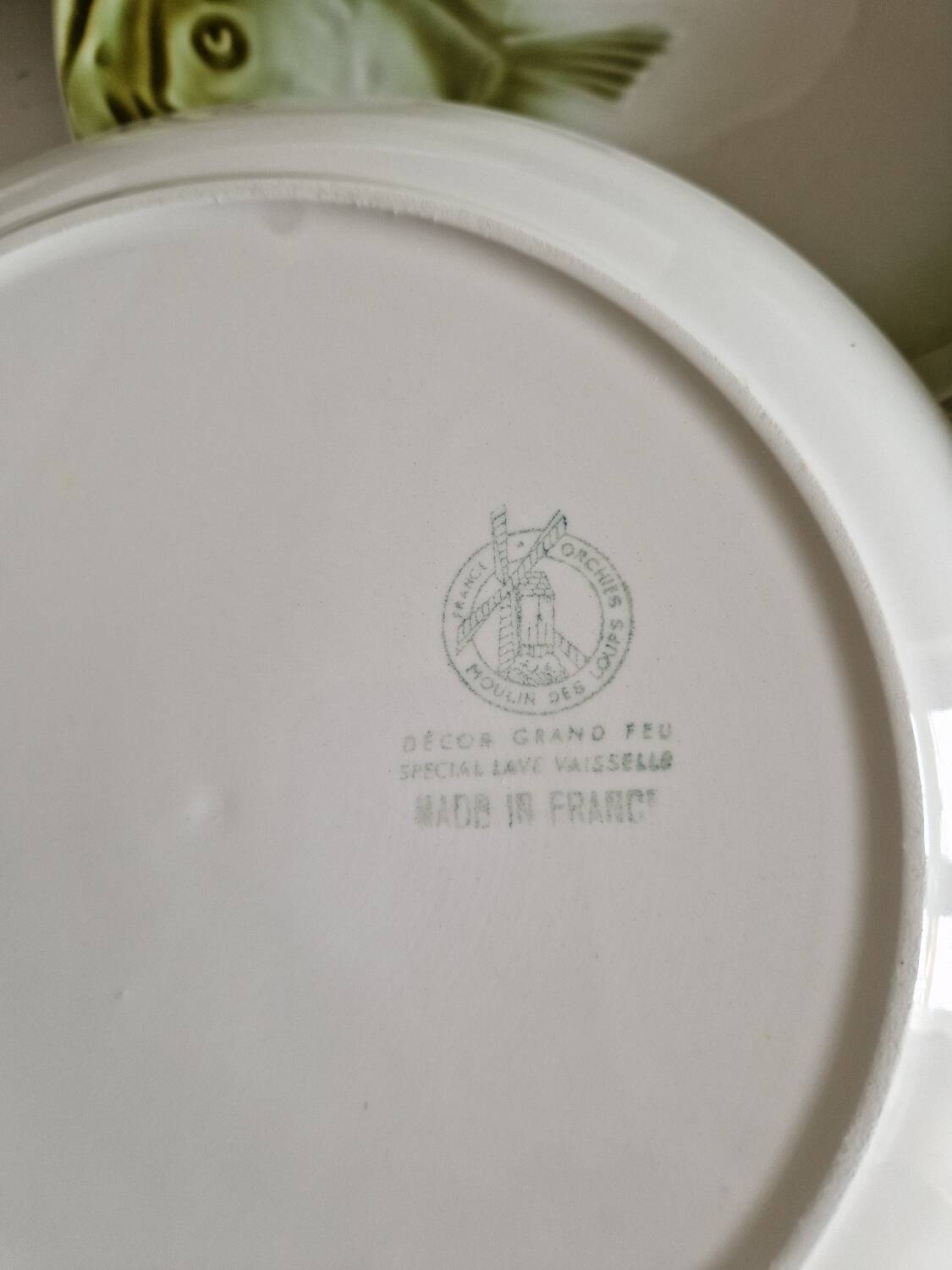 Set of 12 fish plates from the Moulin des Loups factory in Orchies