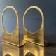 Brass bookends marked Hans-Agne Jakobsson, Sweden, 1960s.
