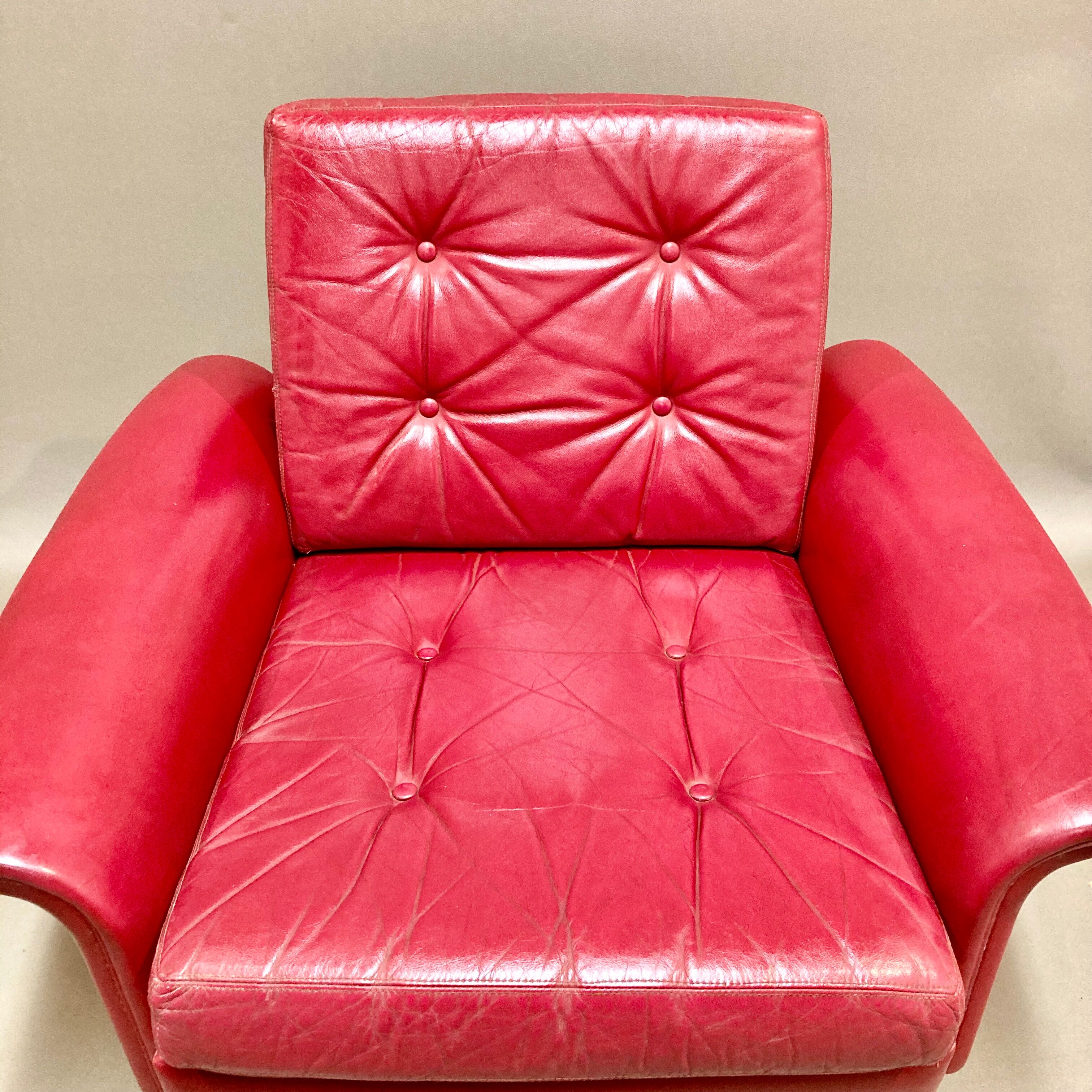 Red leather armchair design 1950