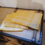 4 old yellow towels
