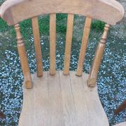 Set of 4 chairs and 1 armchair in mountain style made of oak.
