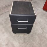 Metal box with used vintage keyless casters