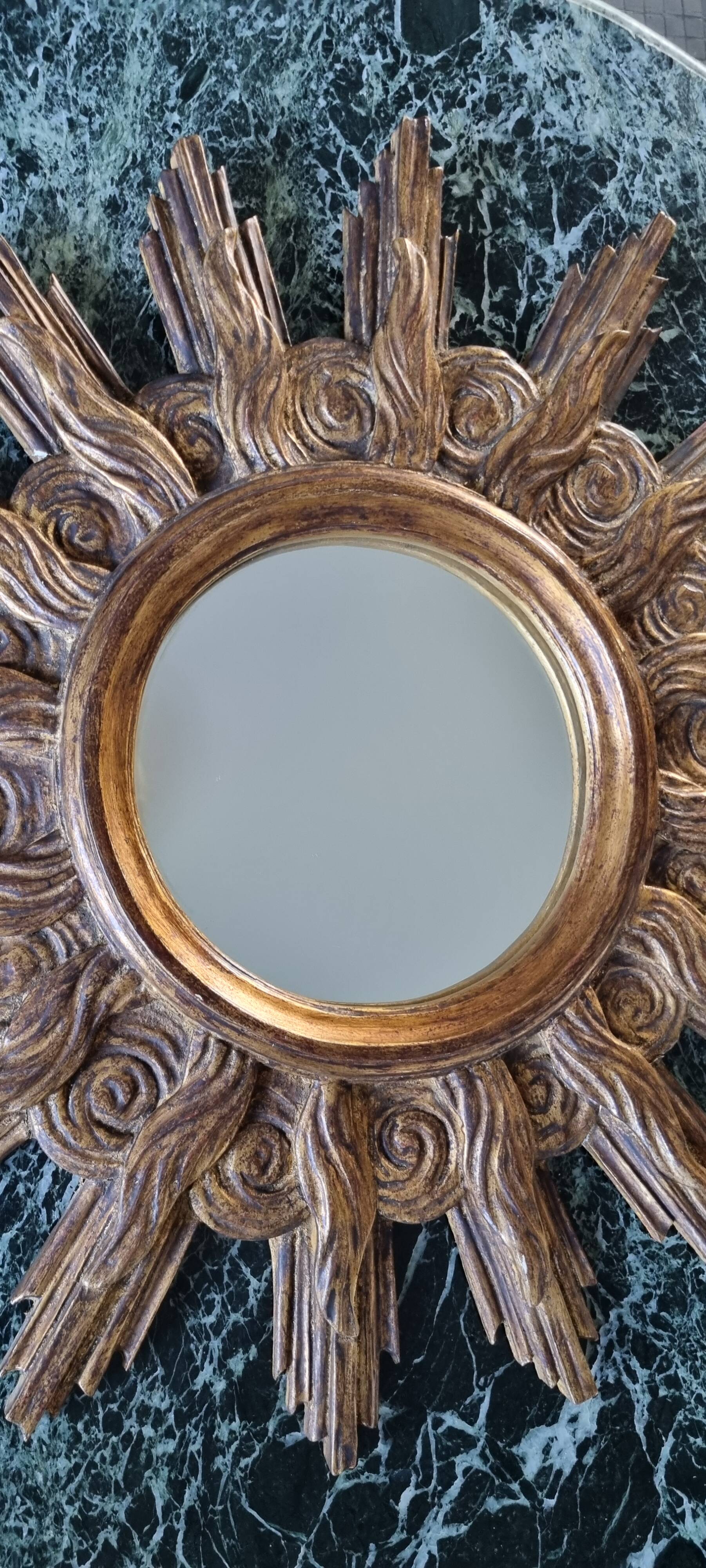 Vintage wooden and gold sun mirror
