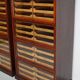 English Haberdashery Shop Cabinet with Glass Fronted Folding Doors, Ca 1920