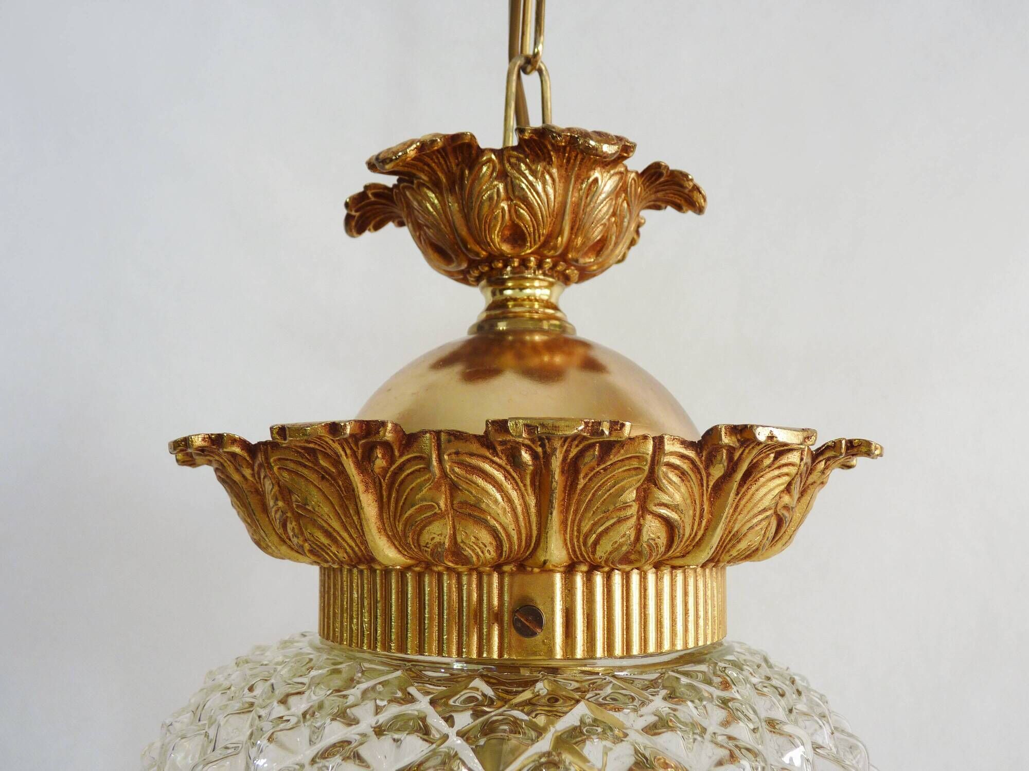 Brass and diamond-tipped chiseled glass globe hanging lamp