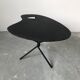 Side table in black lacquered metal, circa 1950.
