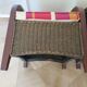 2 armchairs in woven rattan and wood, 1980s