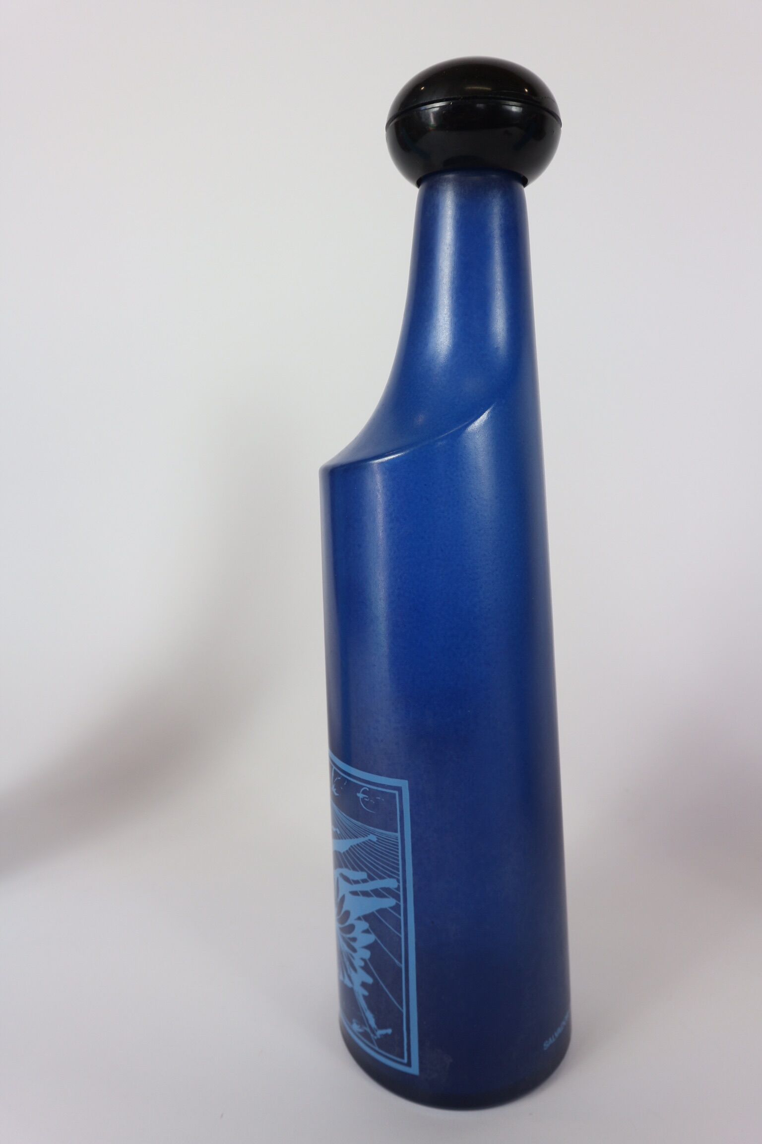 three blue bottles by Salvador Dali for Rosso Antico