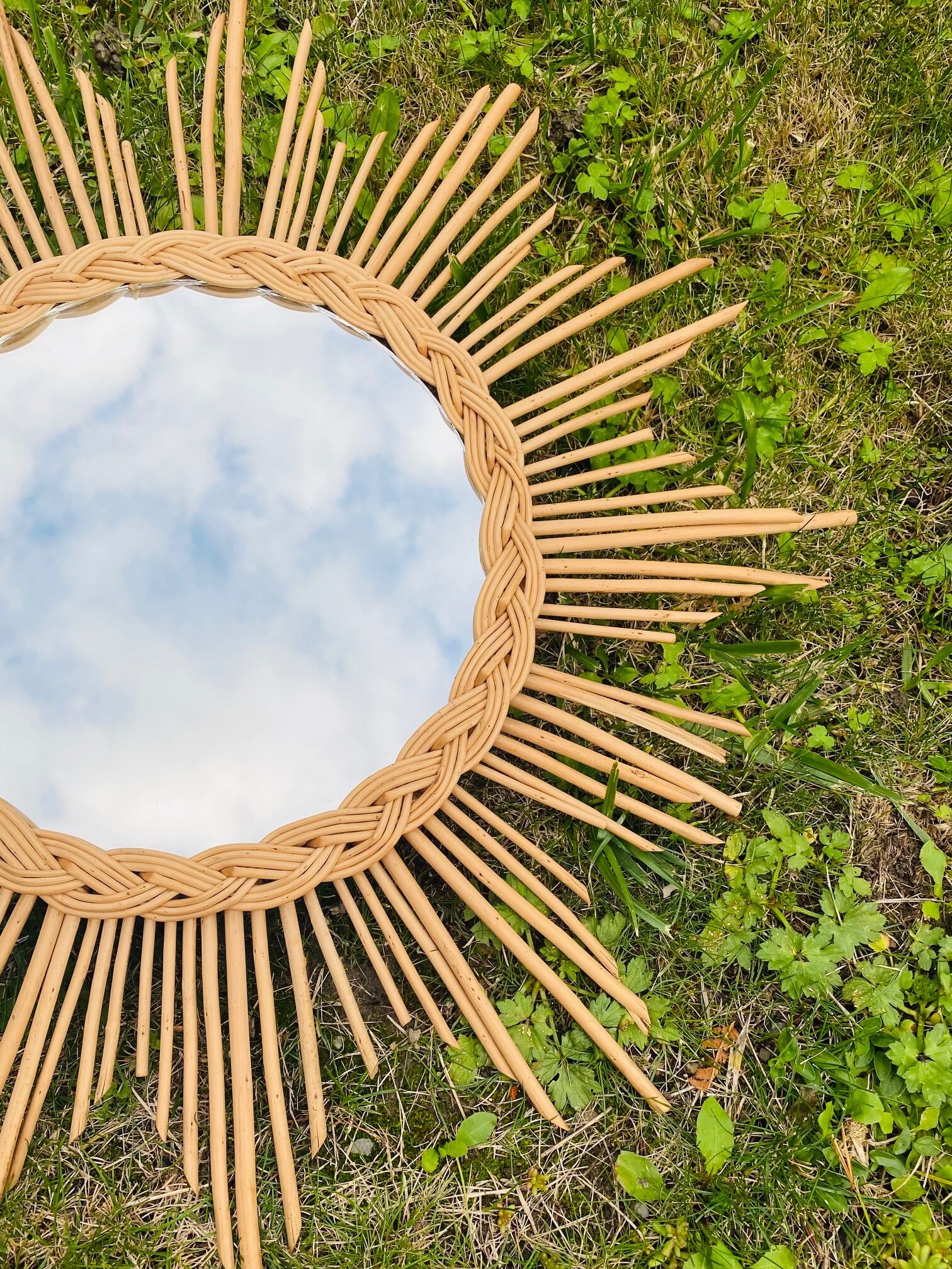 Vintage sun mirror in braided rattan and bamboo 60s/70s.