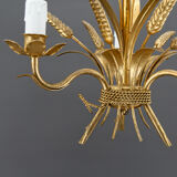 Golden suspension on ears of wheat, circa 1960