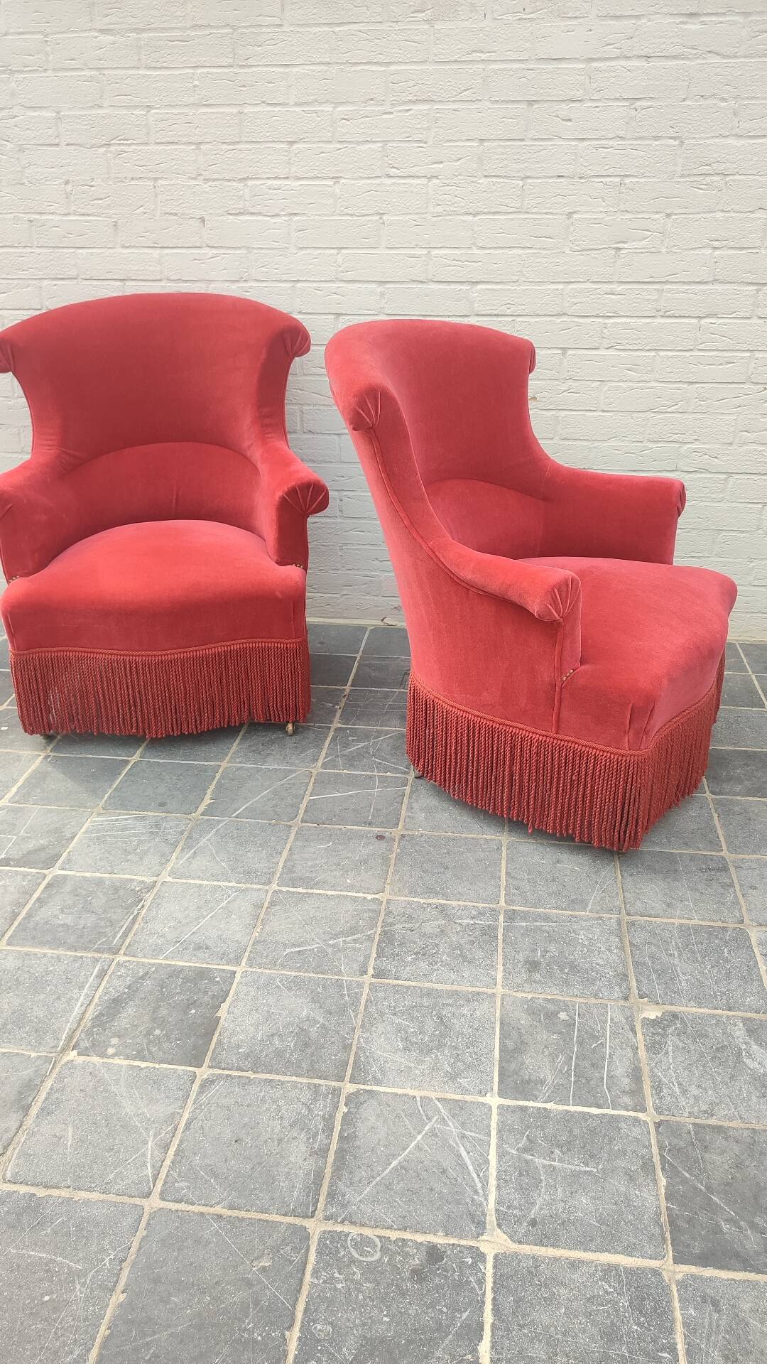 Pair of fringed crapaud armchairs
