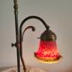 Brass articulated lamp with glass paste signed art of France.