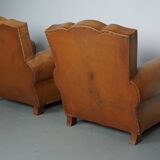 Pair of French Cognac Moustache Back Leather Club Chairs, 1950s