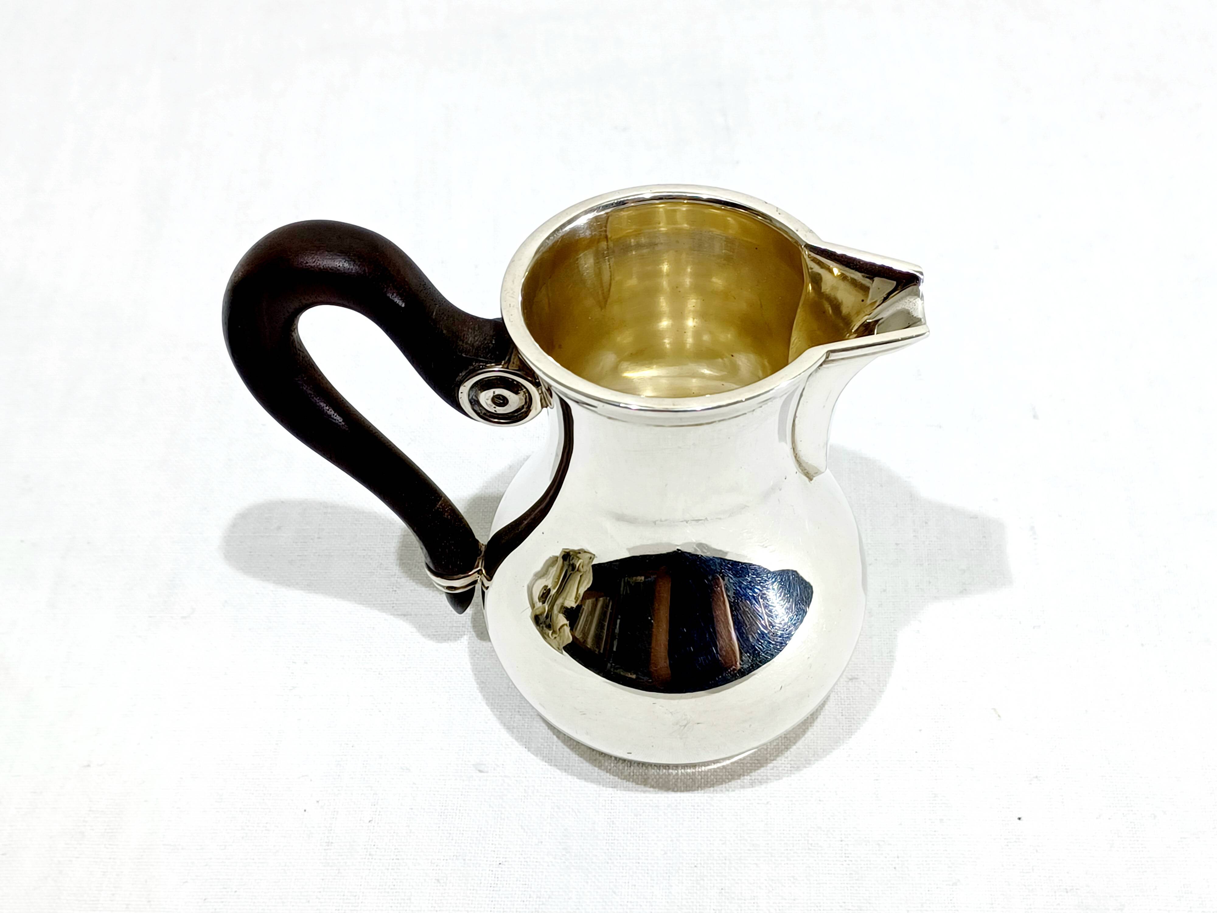 3-piece silver and ebony tea set