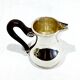 3-piece silver and ebony tea set