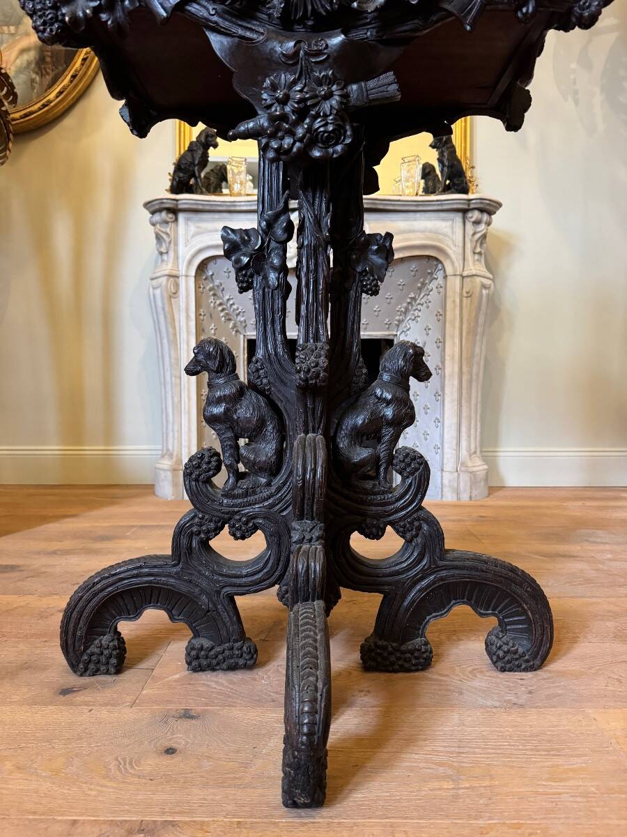 Carved wooden jardinière, Black Forest work, 19th century.