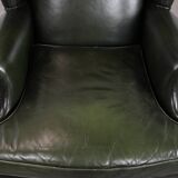 Smooth classic cowhide Chesterfield armchair in a stylish dark green color