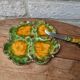 Antique colored ceramic cheese plate with knife