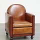 Cognac-colored sheepskin Art Deco design armchair in good condition