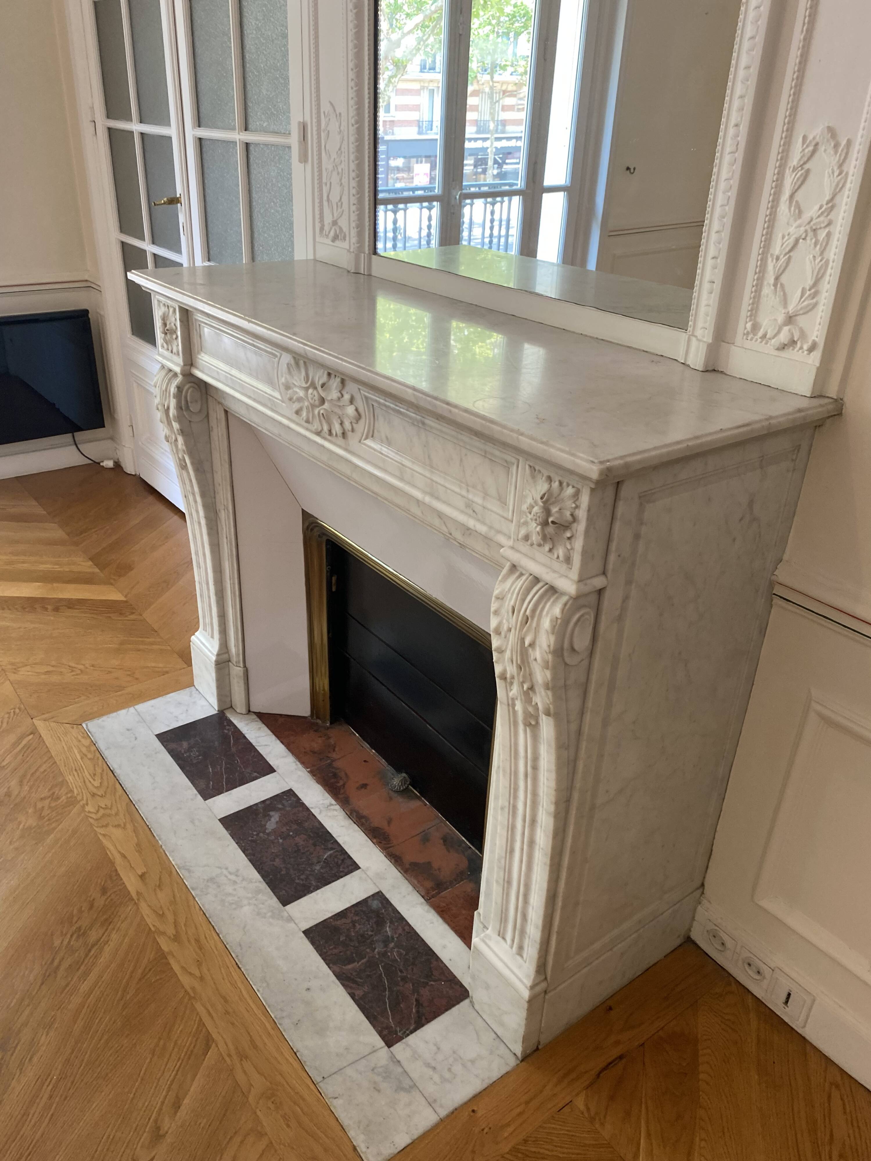 Antique marble fireplace with overmantel and mirror - Haussmannian apartment