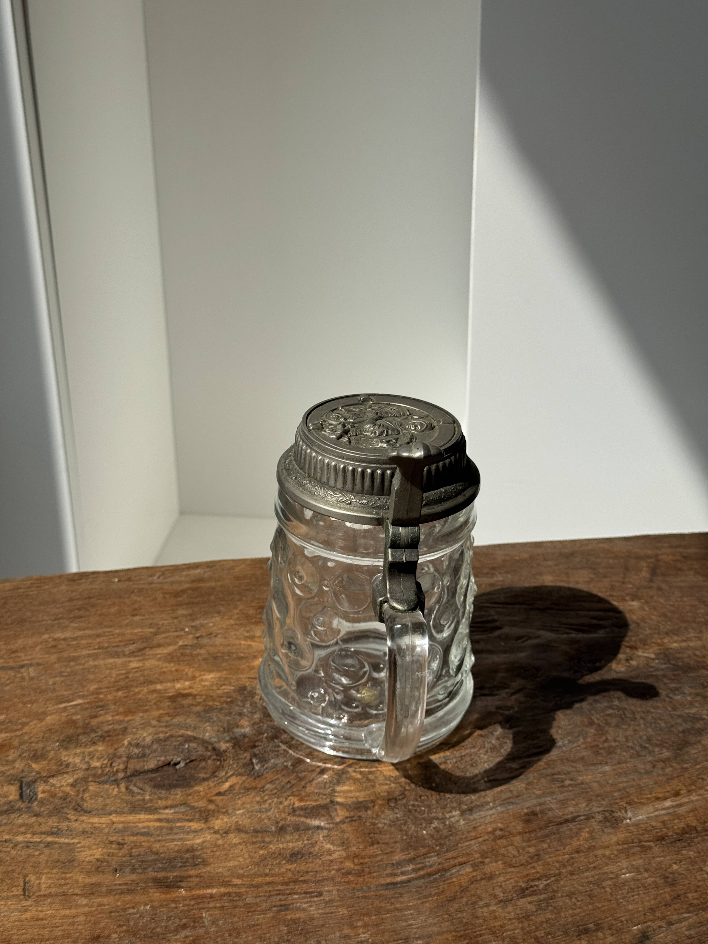Alsatian beer mug with figurative pewter lid