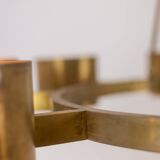 Matte gold brass circular chandelier. Contemporary Italian work.