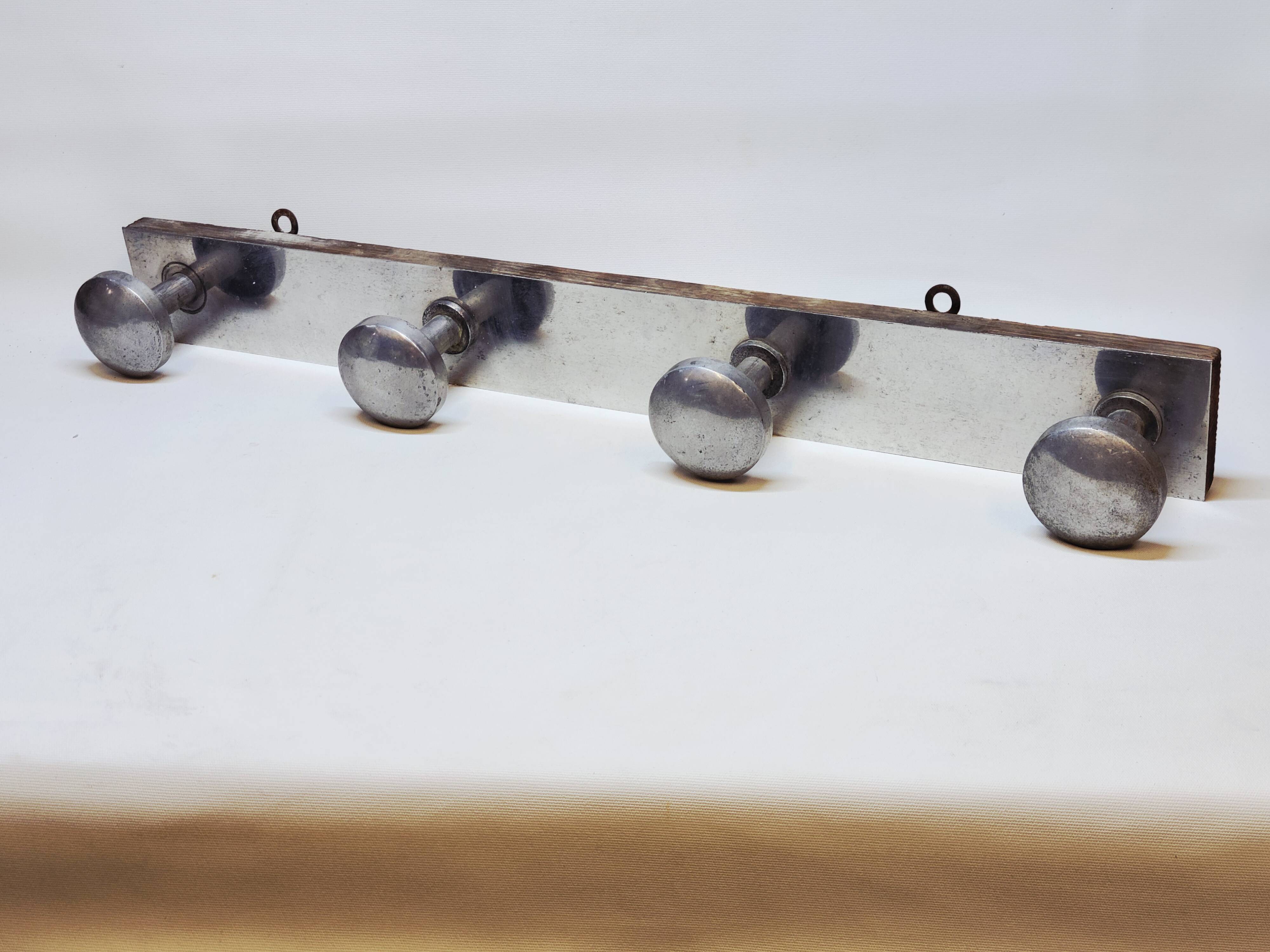 Retro vintage coat rack with 4 aluminum hooks on a wooden frame