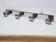 Retro vintage coat rack with 4 aluminum hooks on a wooden frame