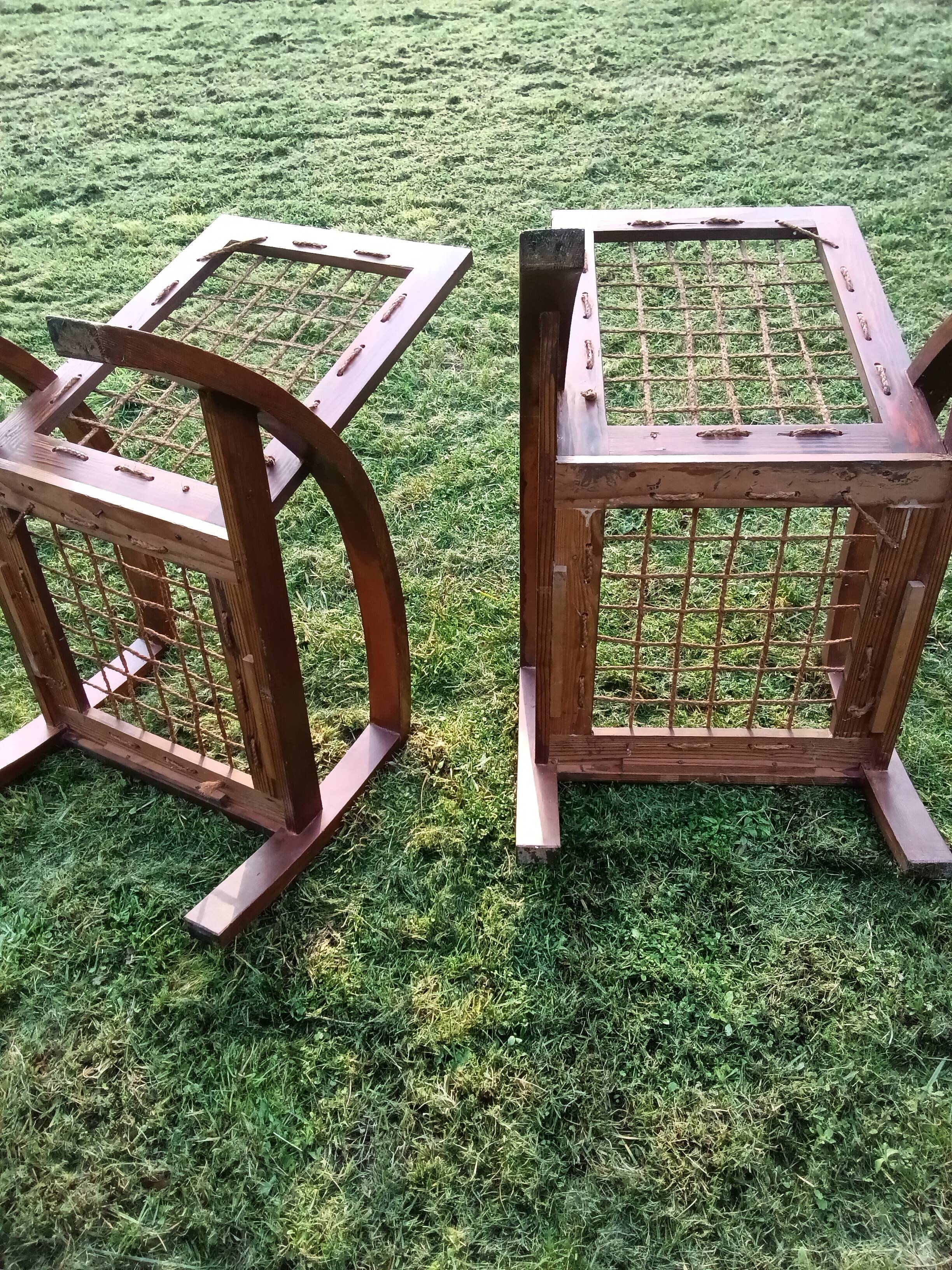 A pair of vintage rope and wood armchairs