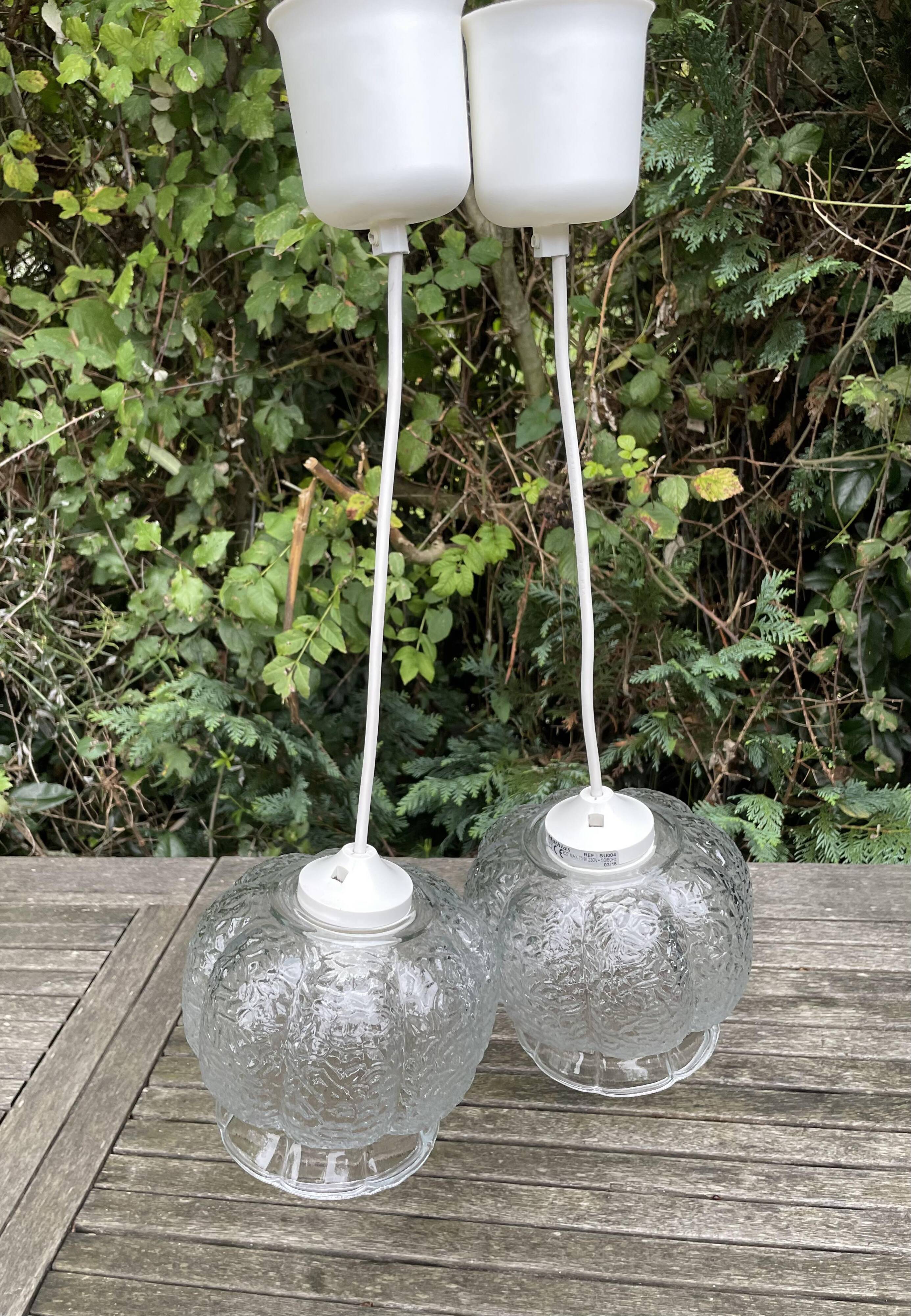 Double Mathias pendant lights ref SU004 in transparent glass in relief corolla shape