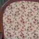 Moulded wooden bench with floral upholstery – Old-fashioned charm