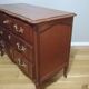 Commode arbalète trois tiroirs en merisier