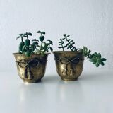 Pair of brass cord pot covers