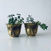 Pair of brass cord pot covers
