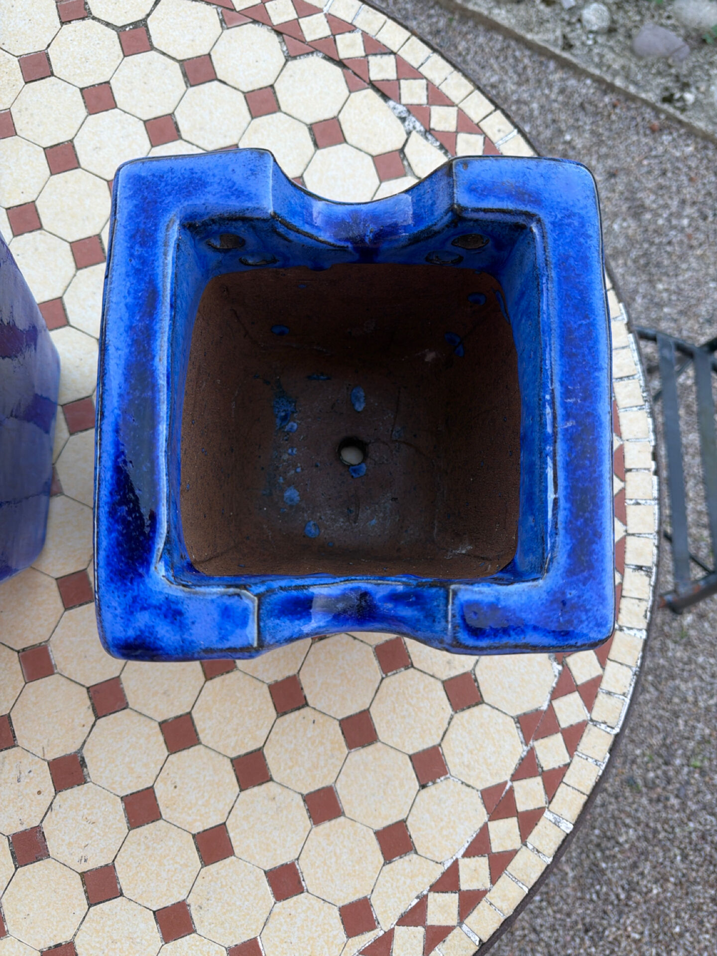 Set of two hanging pots in blue glazed ceramic.